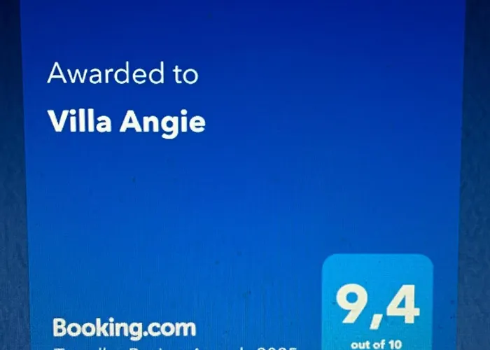 Angie Villa *